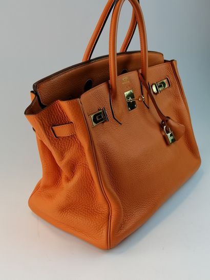 null HERMES- Handbag model Birkin, size 35 in orange togo leather (with its dust...