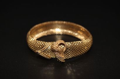 null Bracelet "ceinture" à mailles semi-rigides en or jaune. 58,5 grs