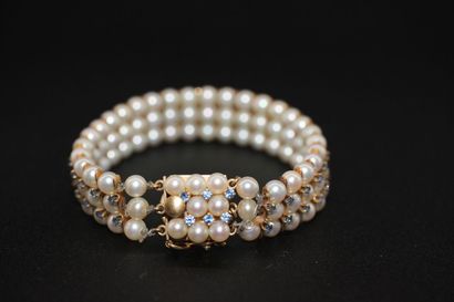 null Bracelet en or jaune 14K orné de perles et pierres bleues. (accidents, manque...