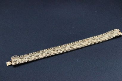 null Bracelet semi-rigide tressé en or jaune. 29,82 grs