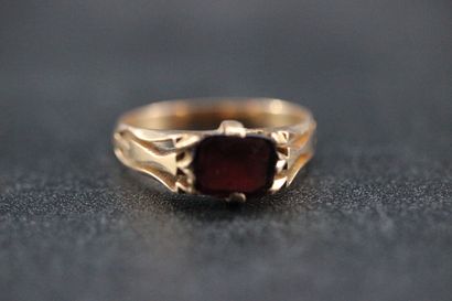 null Small lot of yellow gold jewelry including a ring set with a red stone and a...