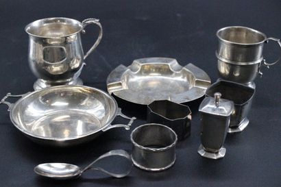 null Silver set including an ashtray, a cup, 2 napkin rings, a small saltcellar,...