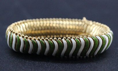 null Articulated bracelet in yellow gold and green and white enamel. PB : 83,4 g...