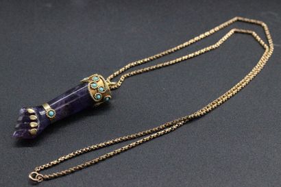 null Purple hard stone arm with gold and turquoise setting (24,83 grs) and a yellow...