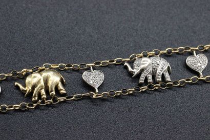 null Yellow gold bracelet decorated with charms "hearts" and "elephants". 20 grs...