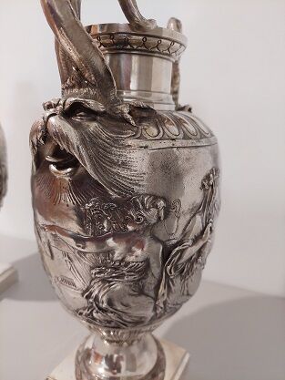 null Pair of silvered bronze vases decorated with antique scenes and two handles...