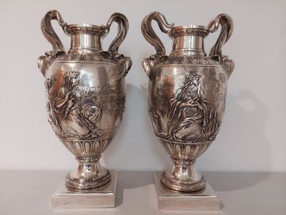 null Pair of silvered bronze vases decorated with antique scenes and two handles...