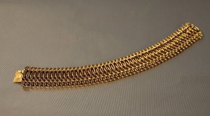 null Large bracelet articulé en or jaune pour dame. 72 grs