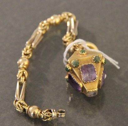 null Bracelet lanterne en or jaune orné de pierres violettes et vertes. PB: 51 g...