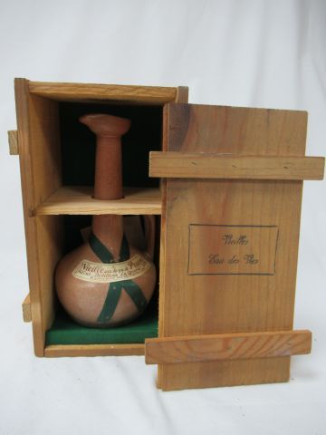 null Bottle of Plum brandy, La Gersoise distillery. 70 cl. In its wooden box.