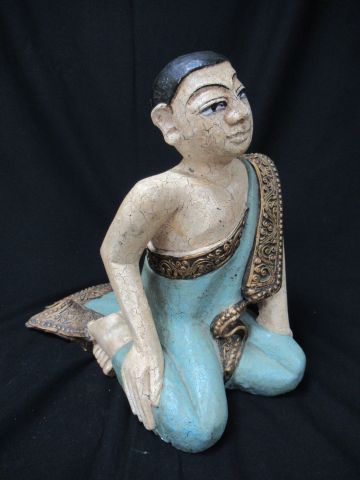 null INDE Sculpture en bois polychrome, figurant un personnage assis. Haut.: 32 ...