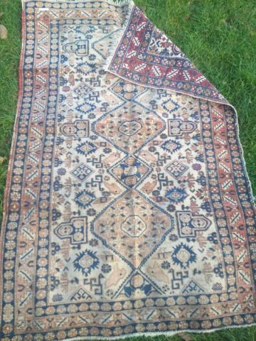 null Wool shiraz carpet with geometric patterns on beige background. Dimensions 105...
