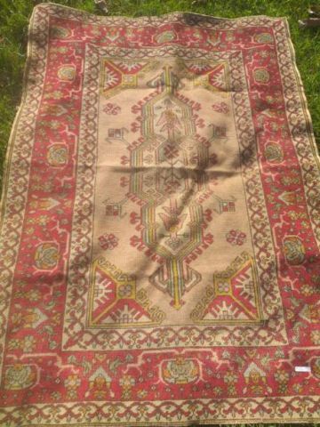 null Wool carpet with stylized motifs on a beige background, red border. Dimensions...