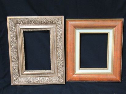 null Set of two wooden frames, one lacquered, the other stuccoed and gilded. Length:...