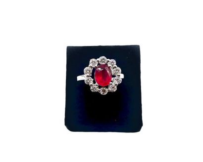 null Ring daisy in silver 925/1000 centered of a ruby probably treated in a white...