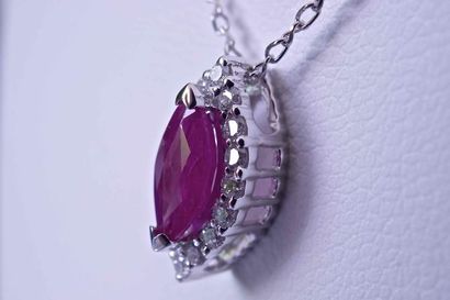 null Necklace in 18 kt white gold set with a certified natural marquise cut ruby...