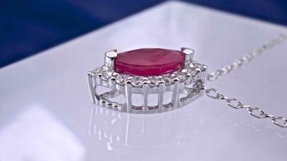 null Necklace in 18 kt white gold set with a certified natural marquise cut ruby...