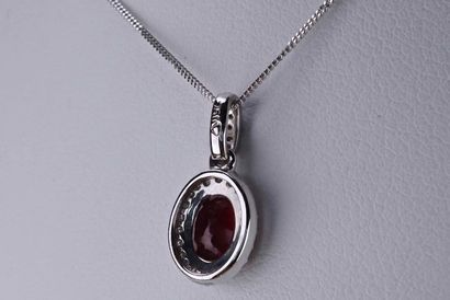 null Necklace in 18 kt rhodium plated white gold and natural red blood ruby of oval...