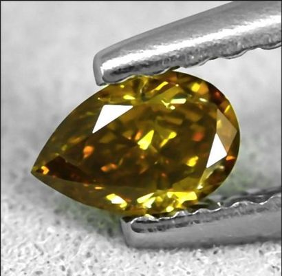 null Exceptionnel Diamant naturel poire de 0,19 carat "Fancy Intense Orangy Yellow"...