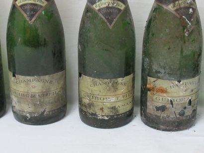 null Set of 6 bottles of Guiborat champagne. (dirty labels, some missing)