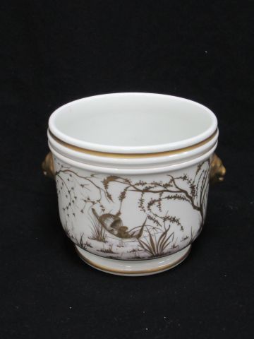 null Rafraîchissoir en porcelaine blanche, à décor chinoisant en or. XIXe siècle....