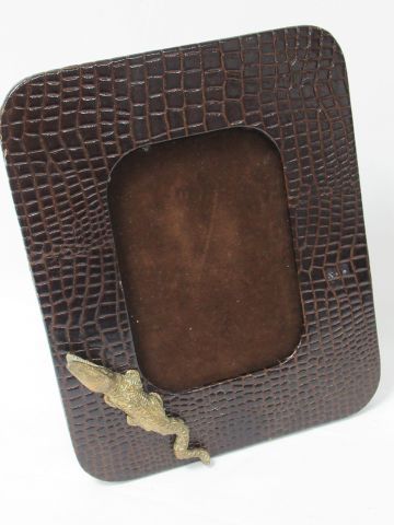 null Wooden photo frame with crocodile style leather, decorated with a bronze crocodile....