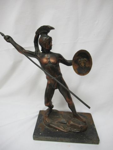 null Sculpture in ruler with medal patina, depicting an ancient warrior. Metal base....