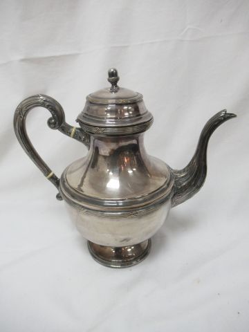 null Teapot in silvery metal. Height: 24 cm
