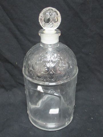 null GUERLAIN Large moulded glass bottle, decorated with bees. Height: 23 cm