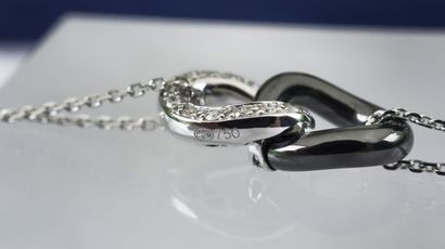 null Bracelet contemporain double chaine en or blanc 18kt avec pendentif en 2 anneaux...