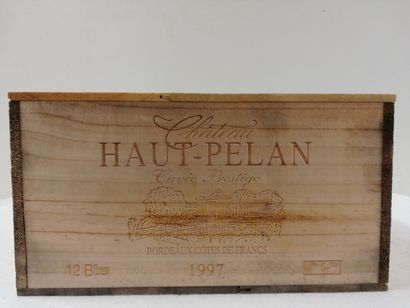 null 12 bouteilles de Château Haut Pélan. 1997. Cuvée prestige. Caisse bois d'or...
