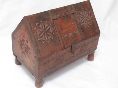 null Carved wooden salt box with stylized plants and rosettes. French regional work...