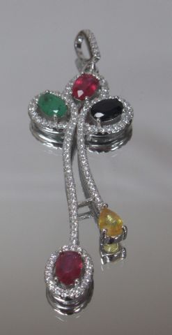 Silver pendant set with rubies, sapphires...