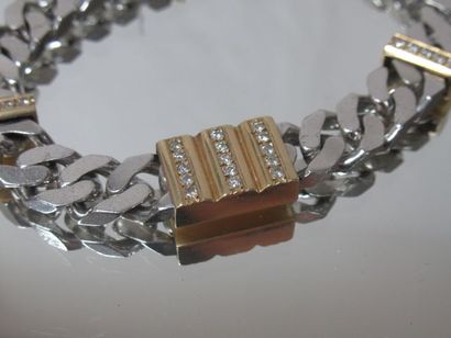 null Bracelet gourmette en or 18K et argent, serti de diamants. Long.: 18 cm. Poids...