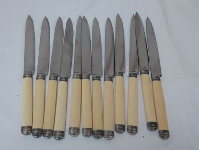  CARDEILHAC Set of 12 table knives with ivory handles (cracks), silver plated metal...