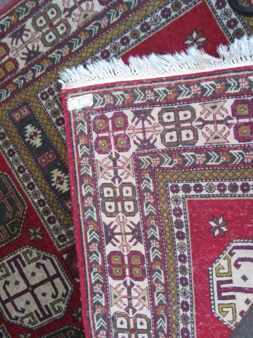  CAUCASE Chirvan wool carpet with geometric decoration on burgundy background. 215...