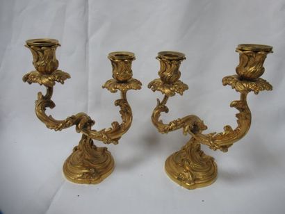null A pair of gilt bronze candelabras. Louis XV style, 19th century. Model by Becher....