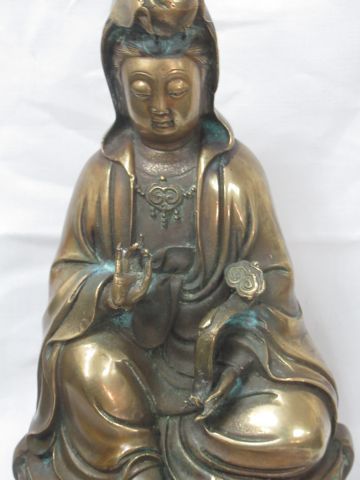 null ASIE Sculpture en bronze, figurant Guanynin. XIXe siècle. 20 cm (dépatinée)