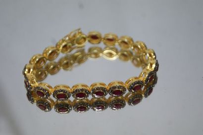 A vermeil bracelet, set with rubies in a...