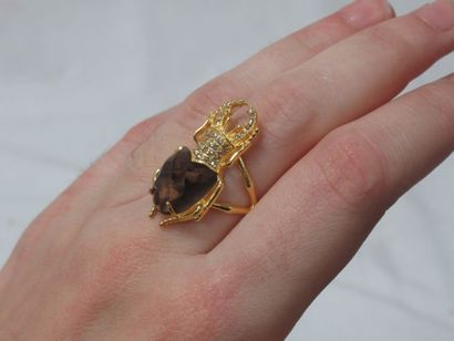 null A vermeil ring in the shape of a beetle, the body formed by a smoky quartz (6.5...