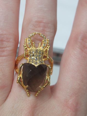 null A vermeil ring in the shape of a beetle, the body formed by a smoky quartz (6.5...