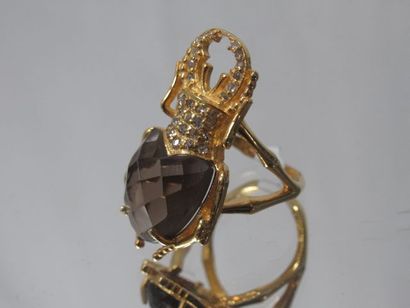 A vermeil ring in the shape of a beetle,...