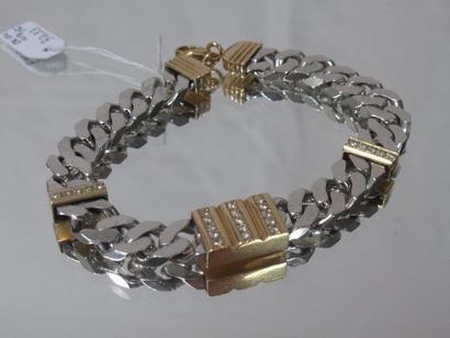 null Bracelet gourmette en or 18K et argent, serti de diamants. Long.: 18 cm. Poids...