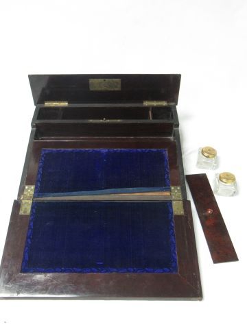 null Wooden traveller's writing case decorated with a brass and mother of pearl cartouche....