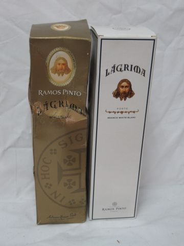 null 2 bouteilles de Porto, Ramos Pinto Lagrima. Dans leurs boîtes (une très abî...