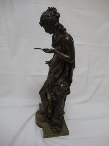 null D'après Mathurin Moreau "Jeune femme au miroir" Epreuve en bronze. Haut.: 46...