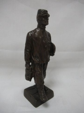 null D'après Georges TRINQUE Petite sculpture en bronze à patine brune, figurant...