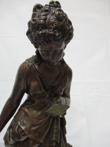 null D'après Mathurin Moreau "Jeune femme au miroir" Epreuve en bronze. Haut.: 46...