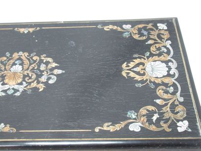 null Tea chest in blackened pearwood, with inlaid mother-of-pearl and brass decoration....