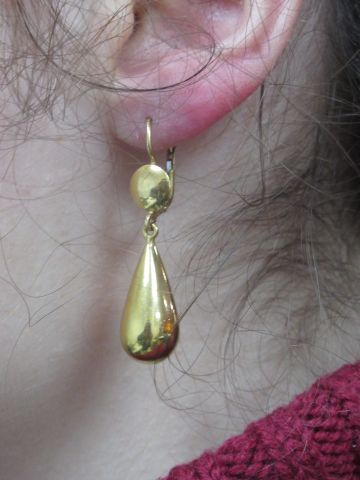 null Pair of earrings "drop" shape in yellow gold 18 kt. Length 4 cm. weight 6,04...